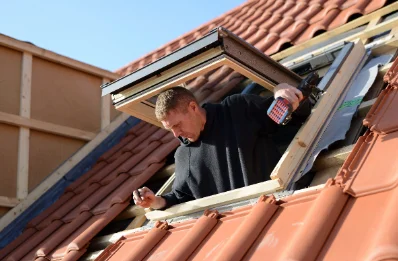 Pose de fenêtres de toit Velux à Auga